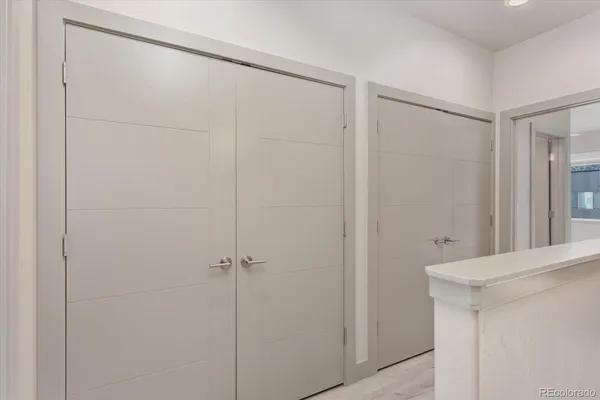 a utility room with sink dryer and washer