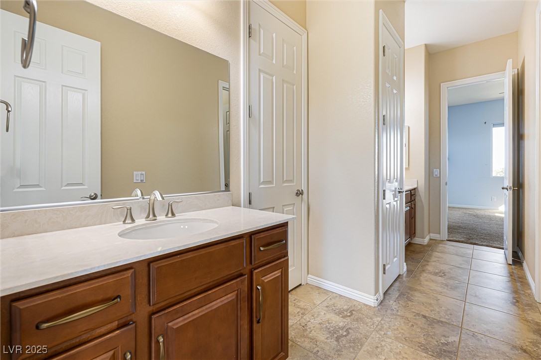 60 Newton Ridge Way Las Vegas, NV 89183 - Photo 33 of 44 Bathroom featuring vanity