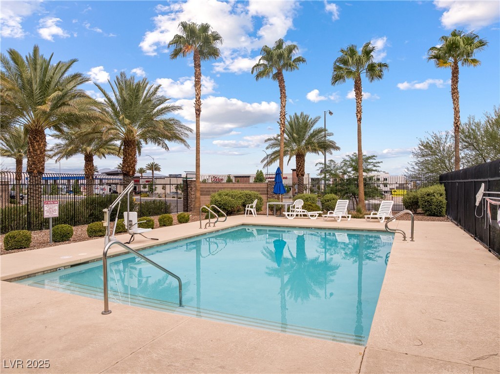 60 Newton Ridge Way Las Vegas, NV 89183 - Photo 39 of 44 Community pool featuring a patio area