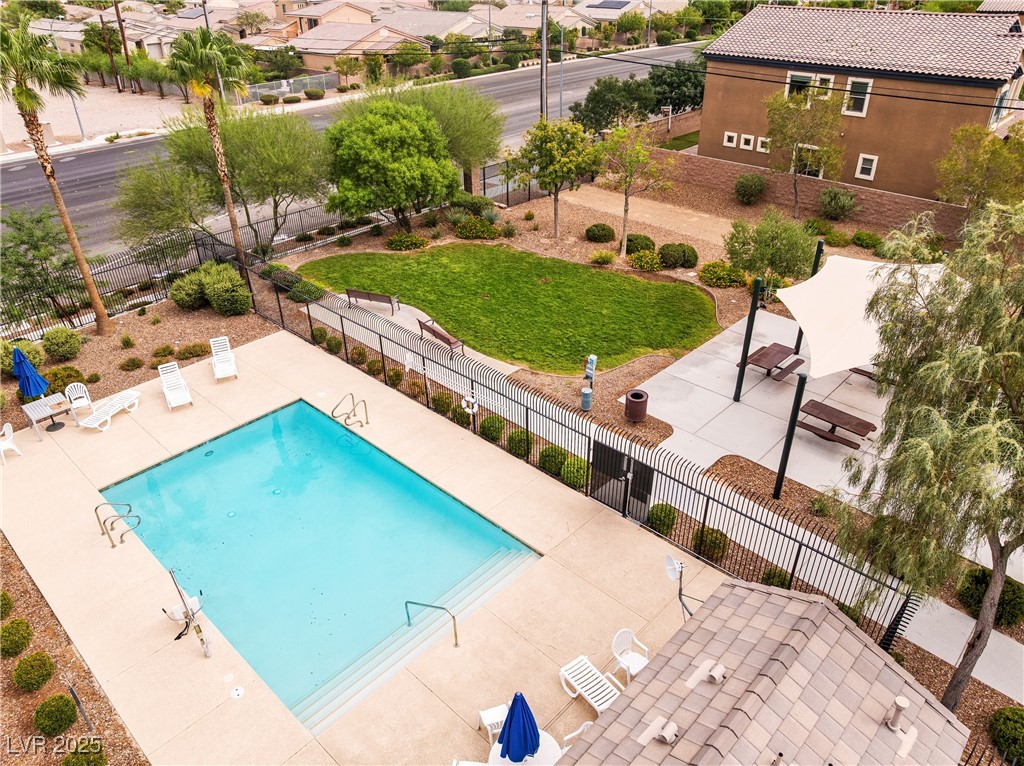 60 Newton Ridge Way Las Vegas, NV 89183 - Photo 40 of 44 View of pool featuring a patio and a residential view