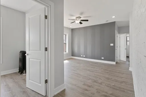 a view of a livingroom with wooden floor