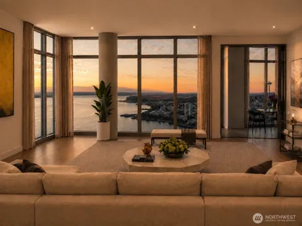 a living room with furniture and floor to ceiling windows