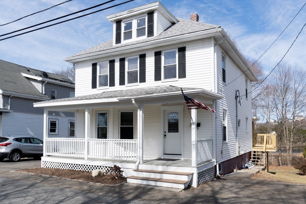 a view of a white building among the street