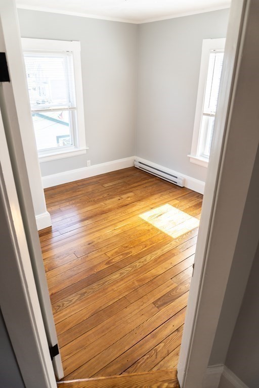 22 Riverside Court Saugus, MA 01906 - Photo 18 of 33 a view of an empty room and window