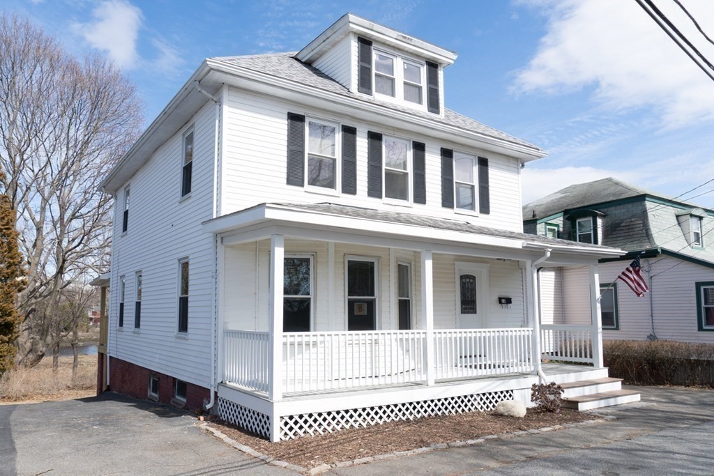 22 Riverside Court Saugus, MA 01906 - Photo 2 of 33 a view of a large white building