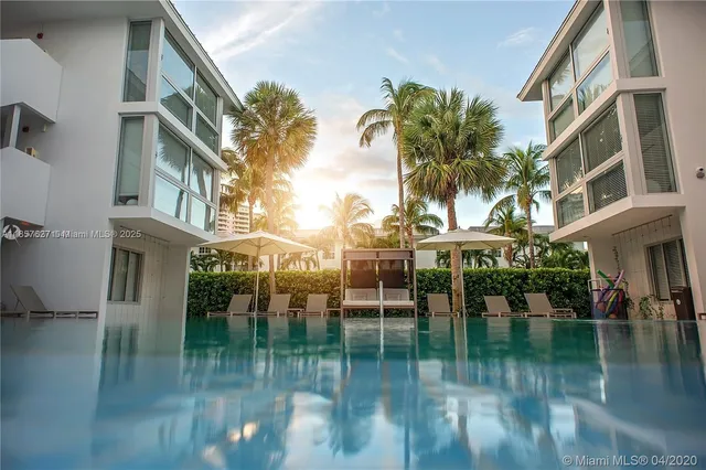 a view of pool with outdoor seating