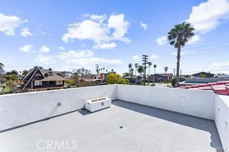 a front view of a house with yard and green space