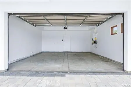 a front view of a house with swimming pool and porch