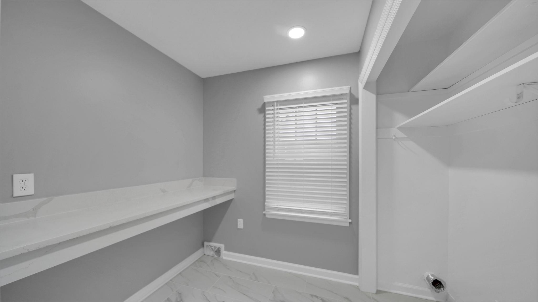 5256 Collingwood Road Memphis, TN 38117 - Photo 28 of 40 Washroom with light marble finish floors and a desk