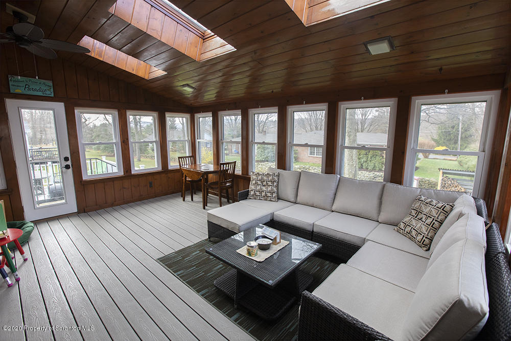 105 Sturbridge Road Clarks Summit, PA 18411 - Photo 24 of 56 a living room with furniture and a large window