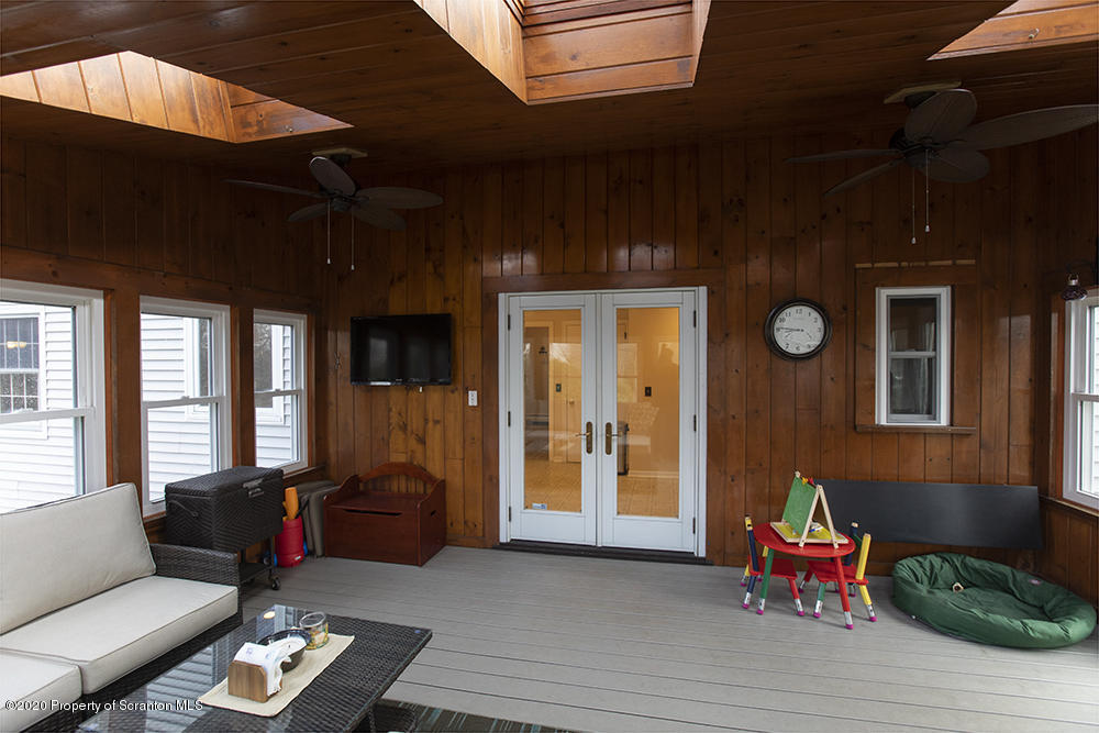 105 Sturbridge Road Clarks Summit, PA 18411 - Photo 25 of 56 a living room with furniture and wooden floor