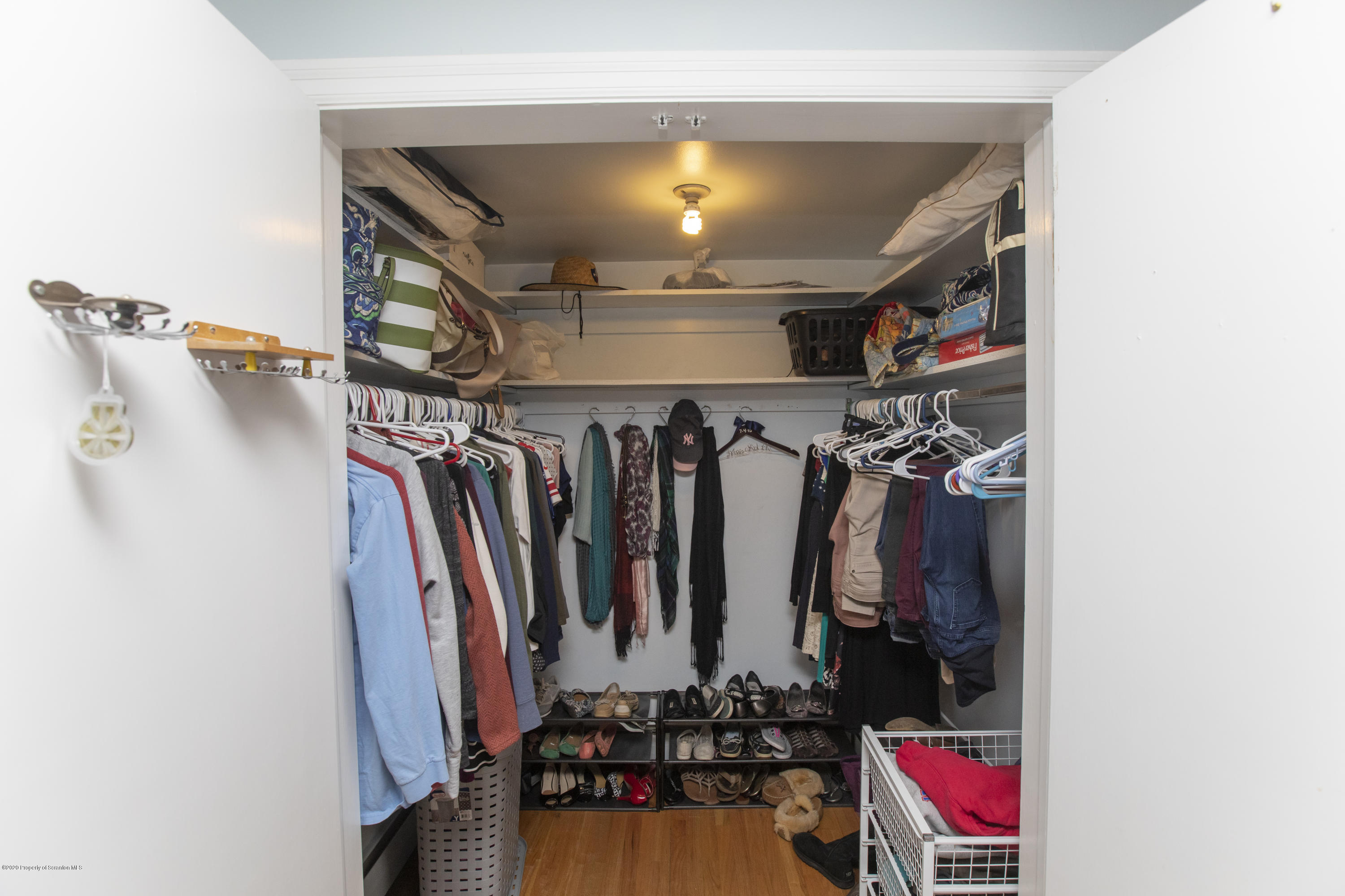105 Sturbridge Road Clarks Summit, PA 18411 - Photo 28 of 56 a view of walk in closet with clothes and shoes