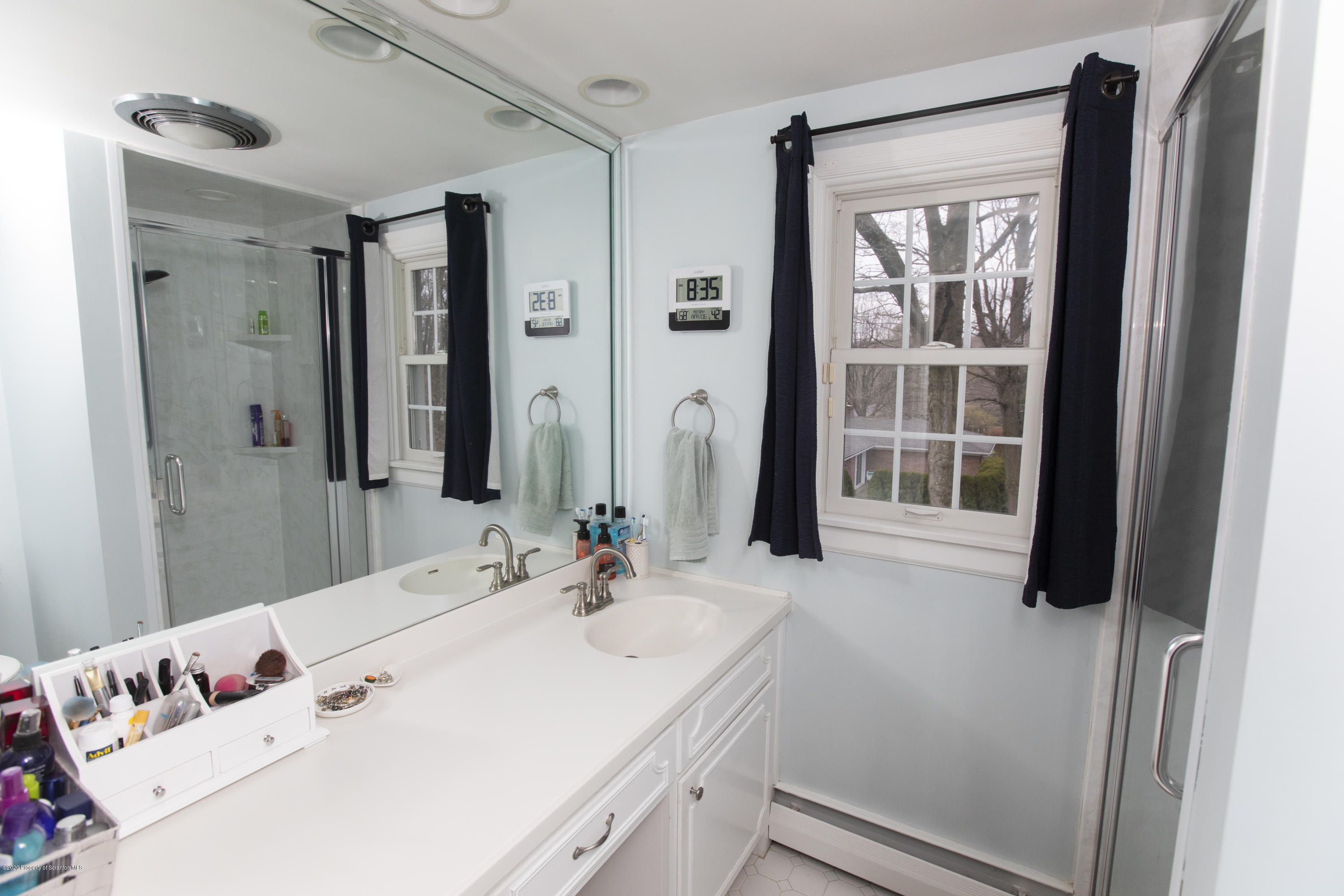 105 Sturbridge Road Clarks Summit, PA 18411 - Photo 43 of 56 a bathroom with a sink and a mirror