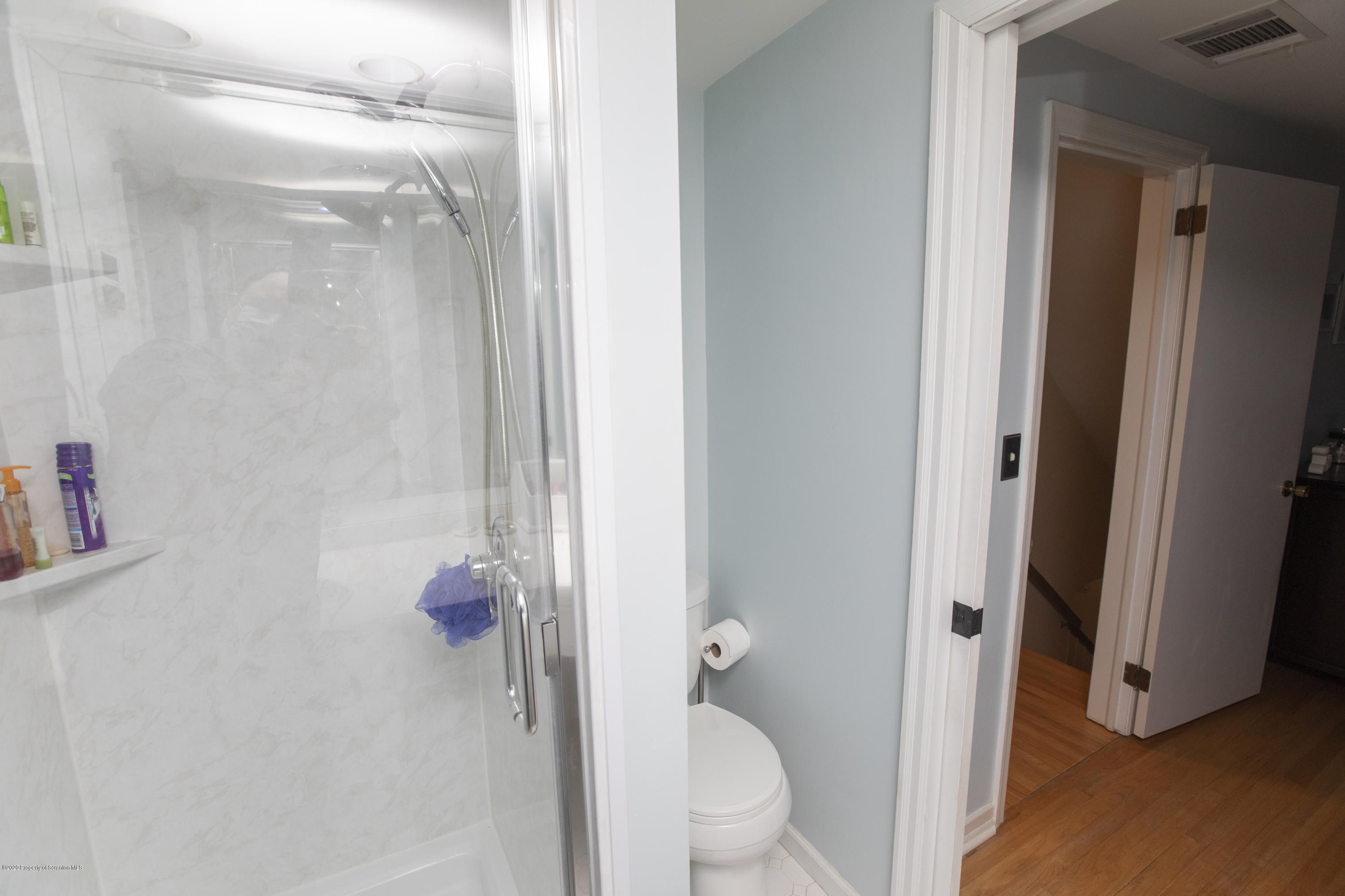 105 Sturbridge Road Clarks Summit, PA 18411 - Photo 44 of 56 a bathroom with a granite countertop shower and a toilet