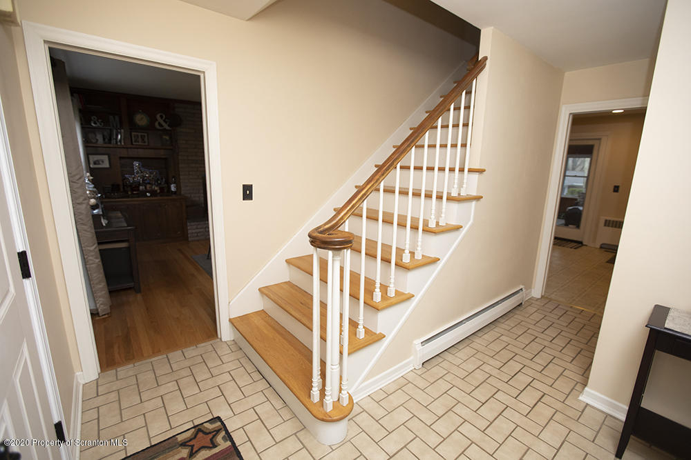 105 Sturbridge Road Clarks Summit, PA 18411 - Photo 5 of 56 a view of entryway and hall with wooden floor