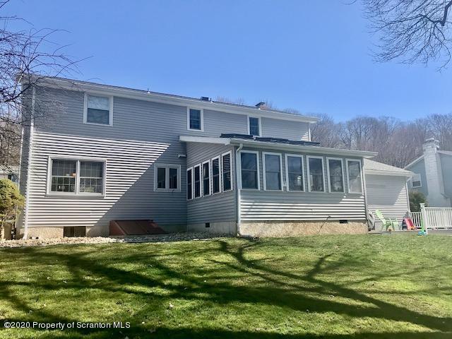 105 Sturbridge Road Clarks Summit, PA 18411 - Photo 55 of 56 a front view of house with yard and green space