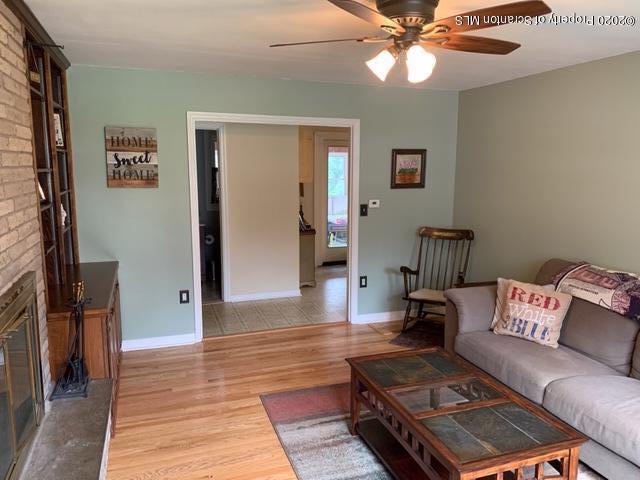 105 Sturbridge Road Clarks Summit, PA 18411 - Photo 8 of 56 a living room with furniture and wooden floor