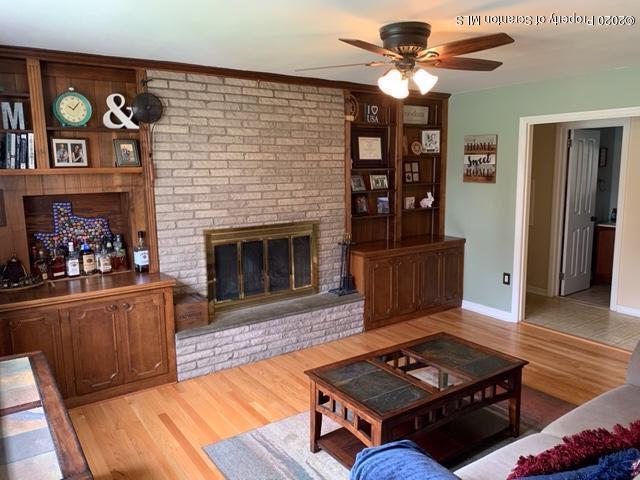 105 Sturbridge Road Clarks Summit, PA 18411 - Photo 9 of 56 a living room with furniture and a fireplace
