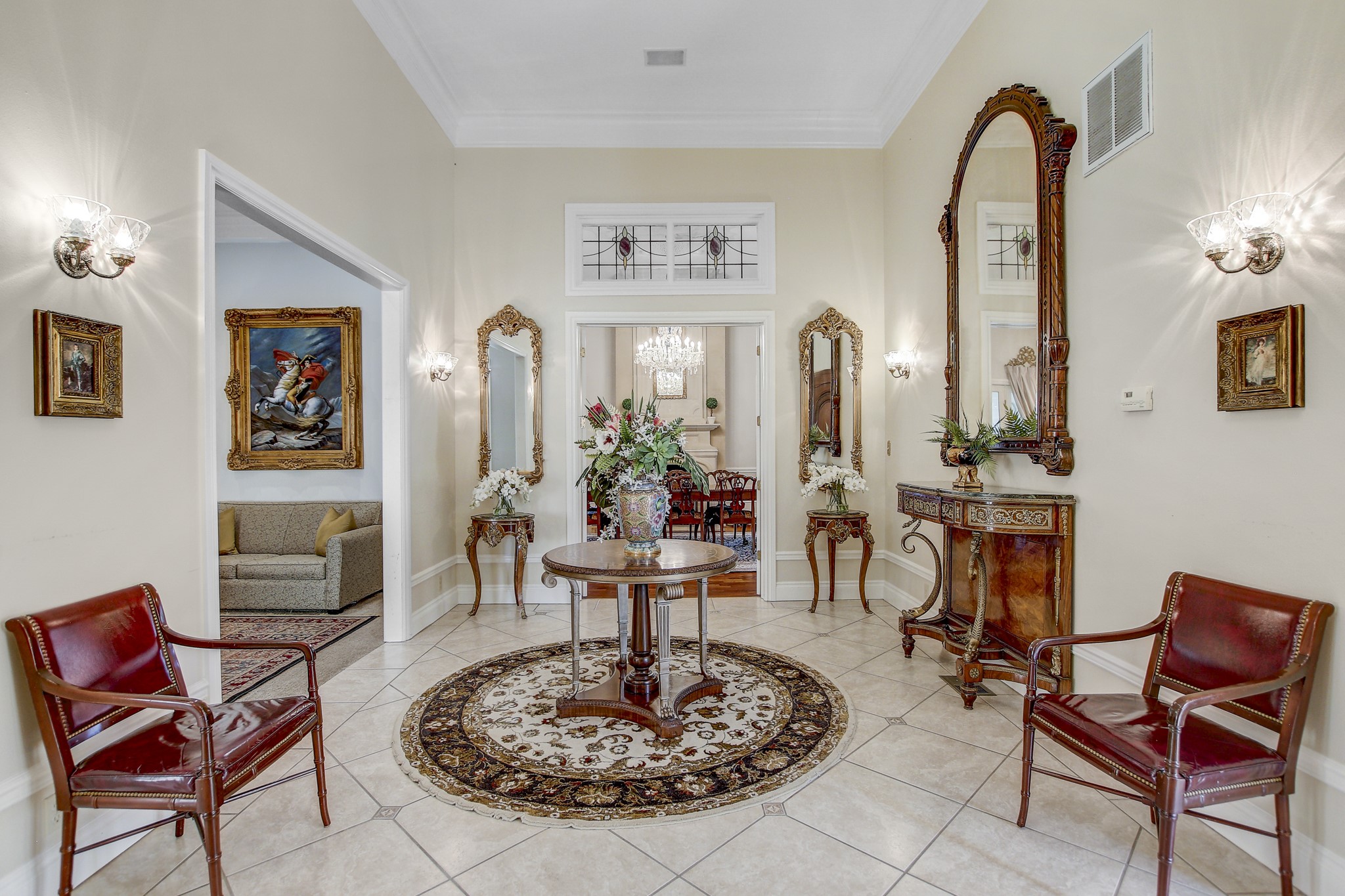 13628 Gregg Manor Road Manor, TX 78653 - Photo 13 of 33 a living room with furniture and a chandelier