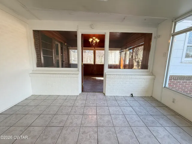 a view of an entryway with a window