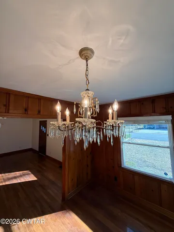 a view of a room with lots of wooden floor