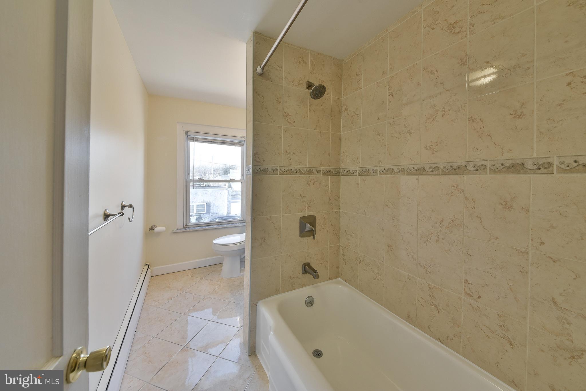 456 North Easton Road Glenside, PA 19038 - Photo 15 of 18 Hall bath with tiled floor & shower tub combo