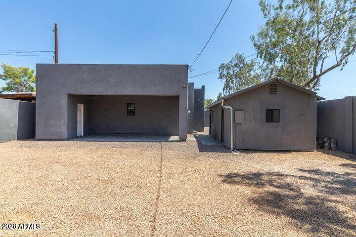 3814 North 9th Street Phoenix, AZ 85014 - Photo 14 of 18 a house with yard in front of it