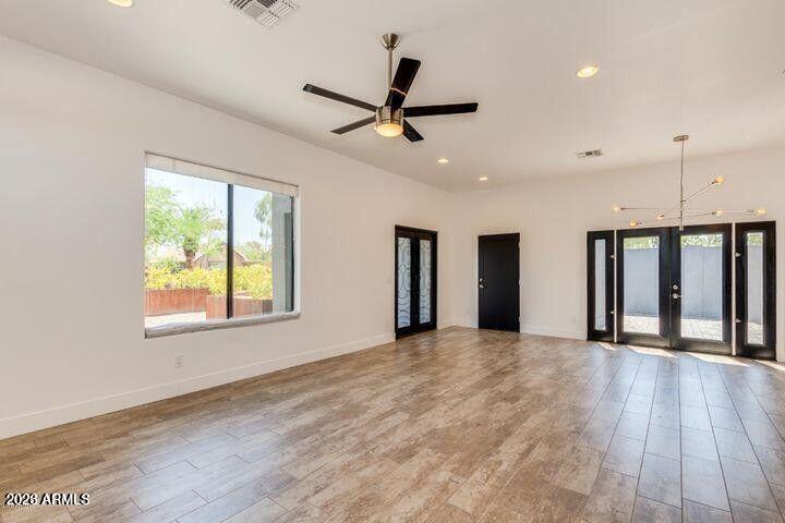 3814 North 9th Street Phoenix, AZ 85014 - Photo 2 of 18 a view of a livingroom with a ceiling fan and window