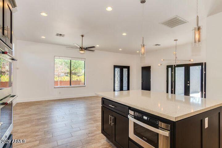 3814 North 9th Street Phoenix, AZ 85014 - Photo 5 of 18 a kitchen with a stove and a sink