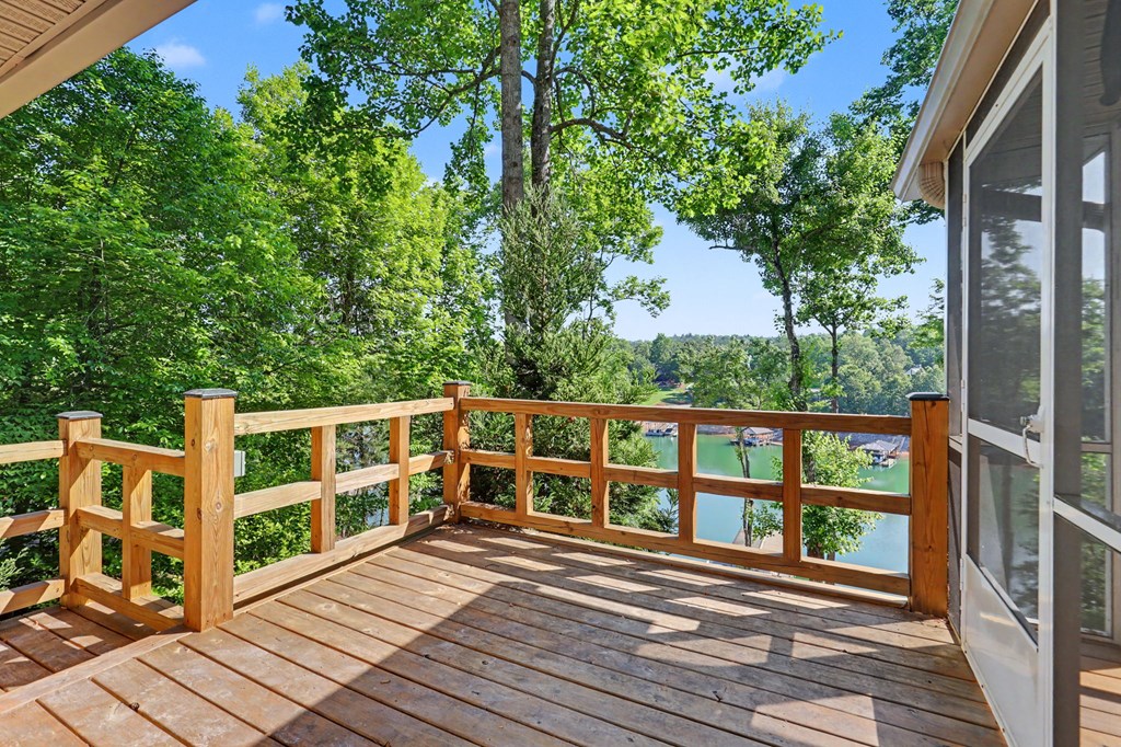 456 Deaver Cove Road Blairsville, GA 30512 - Photo 51 of 83 a view of a wooden deck with a yard