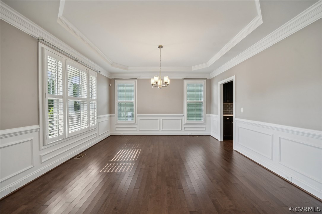 7004 Benhall Circle Glen Allen, VA 23059 - Photo 13 of 50 wooden floor in an empty room with a window