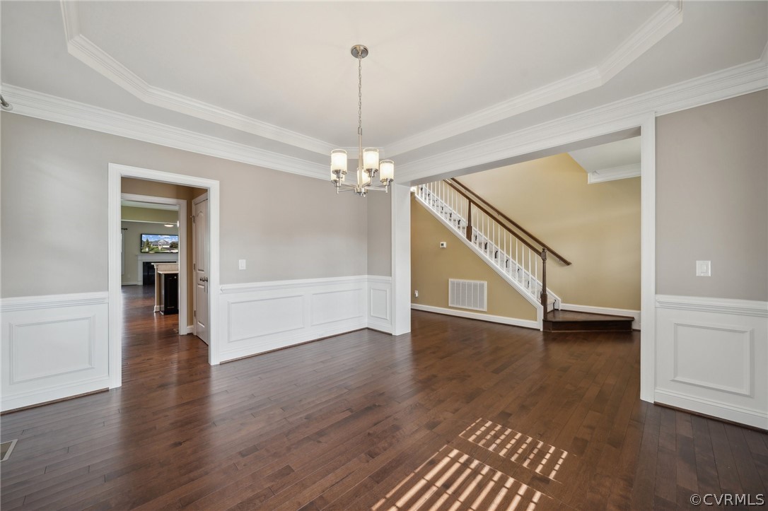 7004 Benhall Circle Glen Allen, VA 23059 - Photo 14 of 50 a view of a hallway with wooden floor and staircase