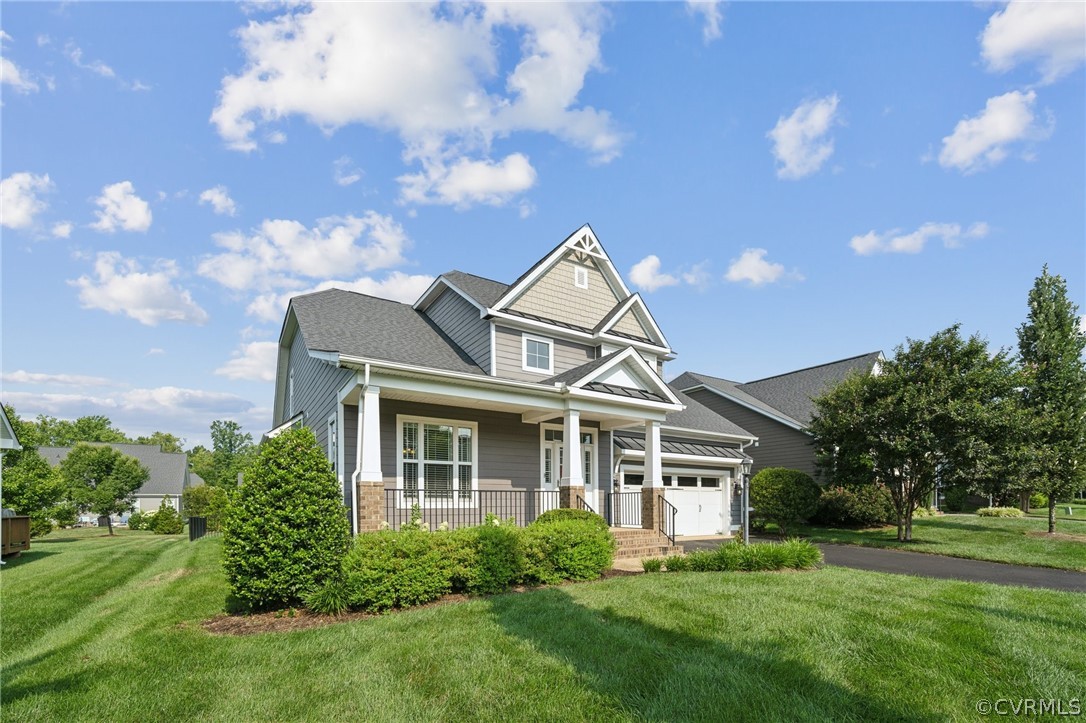 7004 Benhall Circle Glen Allen, VA 23059 - Photo 2 of 50 a front view of a house with a yard