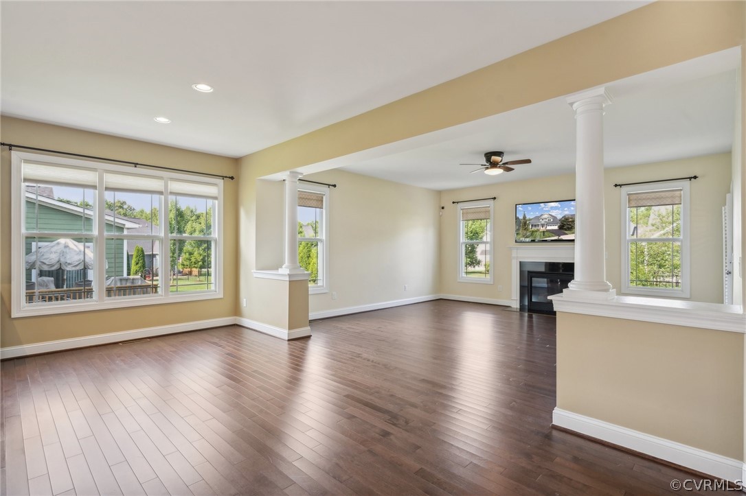 7004 Benhall Circle Glen Allen, VA 23059 - Photo 24 of 50 a view of an empty room with wooden floor and a window