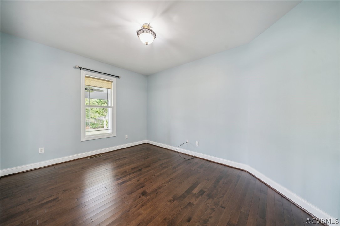 7004 Benhall Circle Glen Allen, VA 23059 - Photo 26 of 50 an empty room with wooden floor and windows