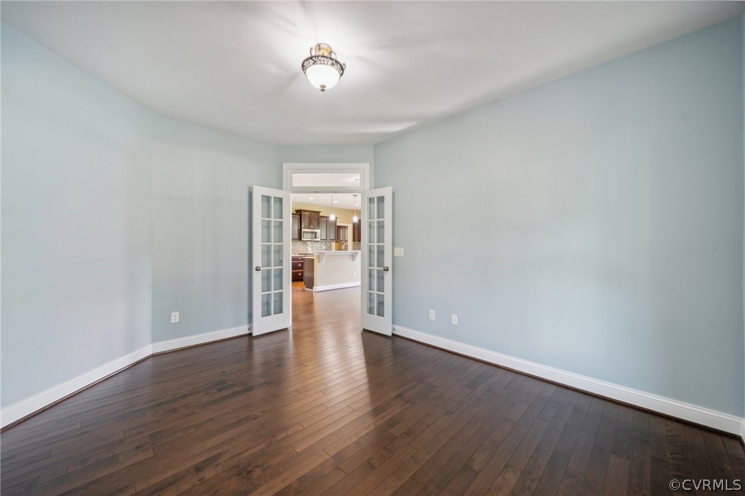 7004 Benhall Circle Glen Allen, VA 23059 - Photo 27 of 50 a view of empty room with wooden floor