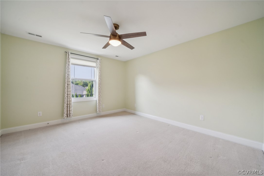 7004 Benhall Circle Glen Allen, VA 23059 - Photo 40 of 50 an empty room with a window and a fan