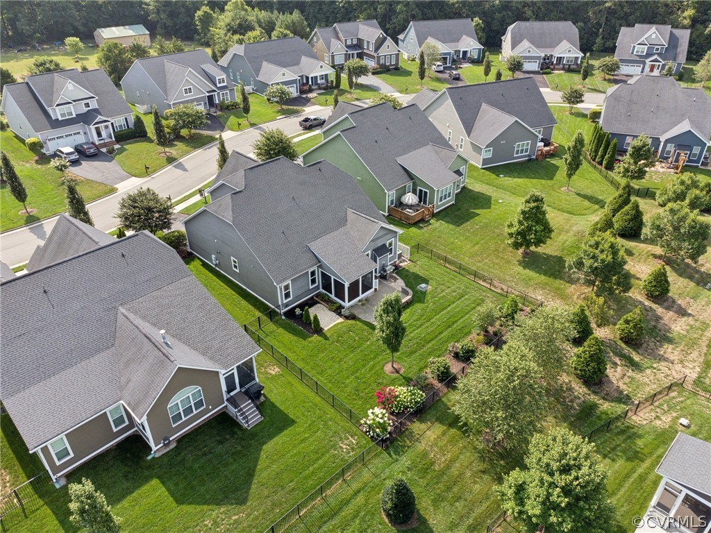 7004 Benhall Circle Glen Allen, VA 23059 - Photo 43 of 50 an aerial view of residential houses with outdoor space and parking