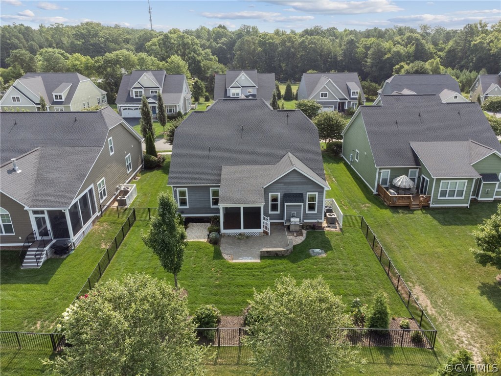 7004 Benhall Circle Glen Allen, VA 23059 - Photo 44 of 50 an aerial view of multiple houses with yard