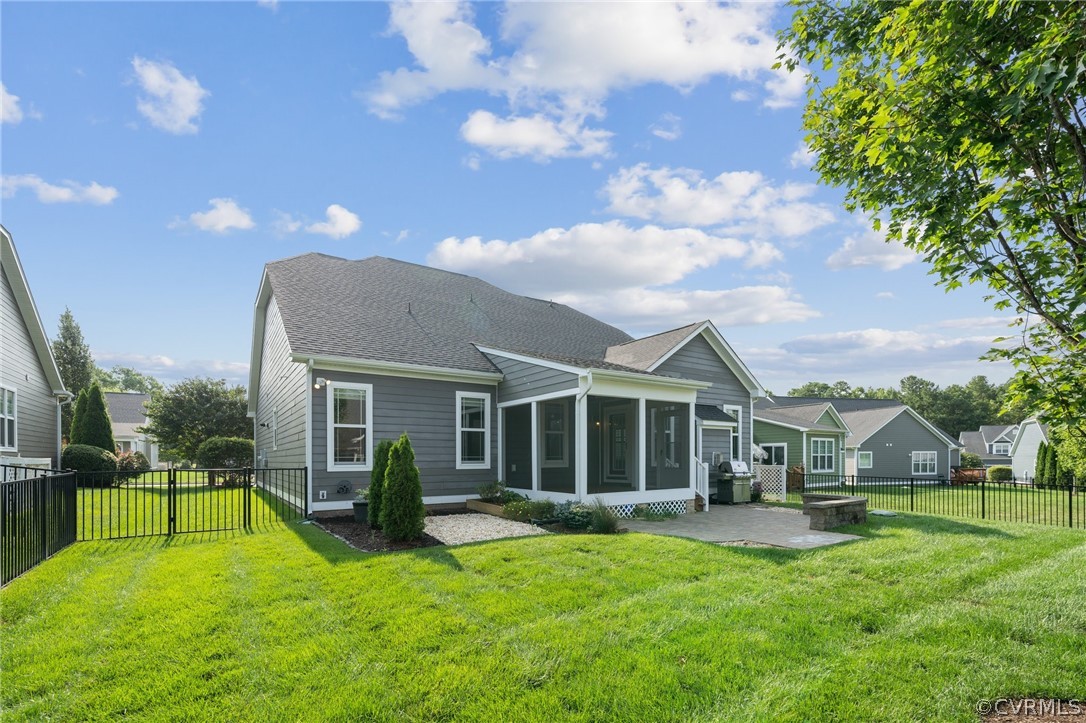 7004 Benhall Circle Glen Allen, VA 23059 - Photo 5 of 50 a view of a house with a backyard
