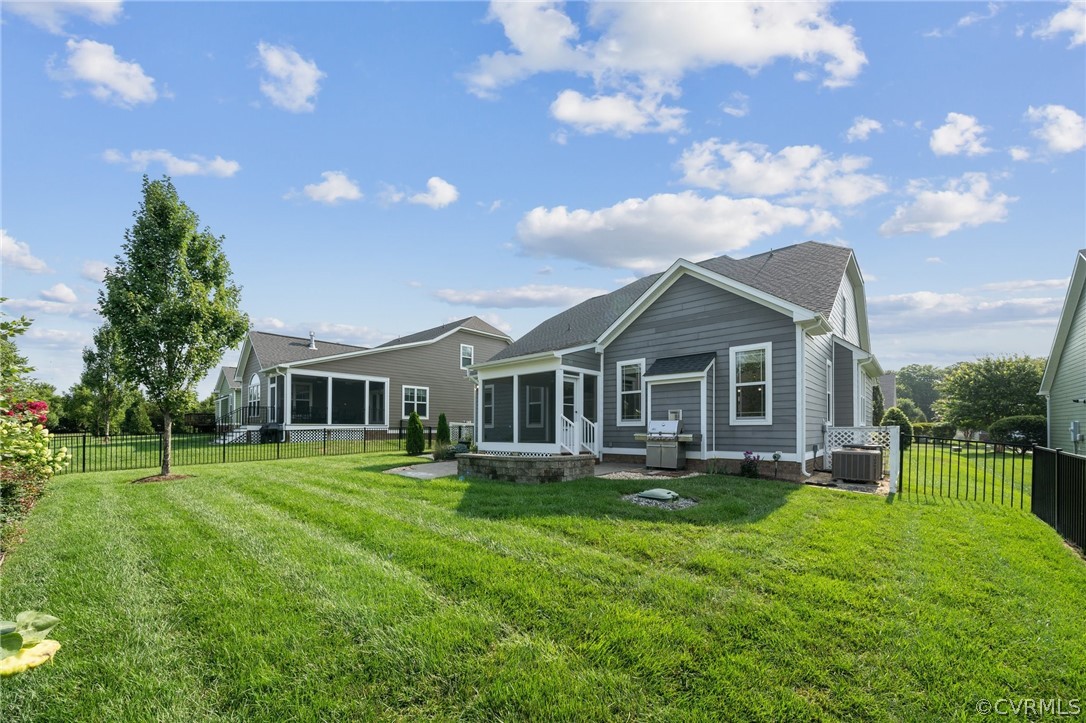 7004 Benhall Circle Glen Allen, VA 23059 - Photo 7 of 50 a front view of house with a garden and trees