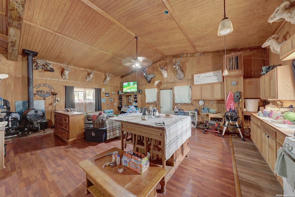 1443 Gina Road Harper, TX 78631 - Photo 8 of 49 a view of a dining room with furniture window and wooden floor