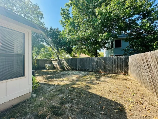 a view of a yard with a trees