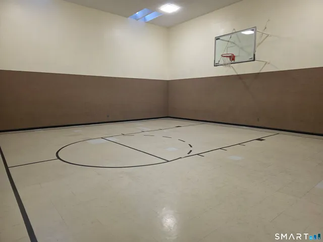 a workspace with furniture and window