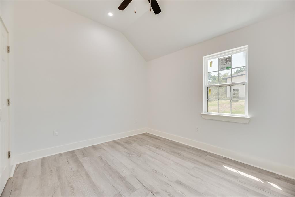 6031 Plum Dale Road Dallas, TX 75241 - Photo 11 of 23 an empty room with a window
