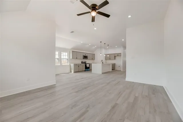 a view of kitchen and windows