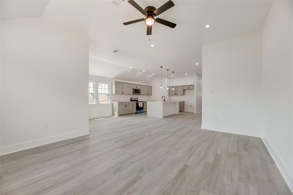 6031 Plum Dale Road Dallas, TX 75241 - Photo 4 of 23 a view of kitchen and windows