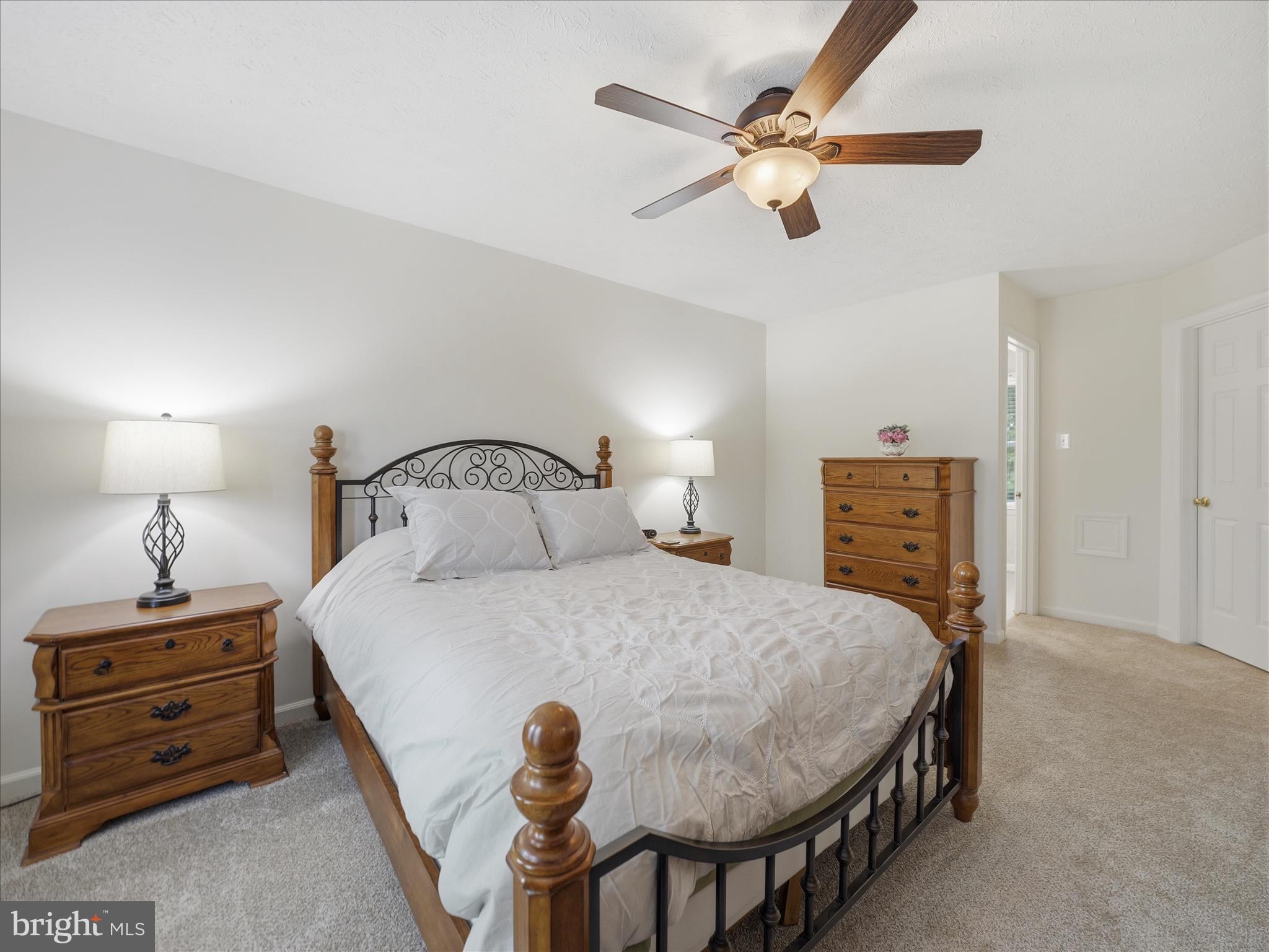 7 Coldstream Court Boonsboro, MD 21713 - Photo 23 of 43 a bedroom with a bed and ceiling fan