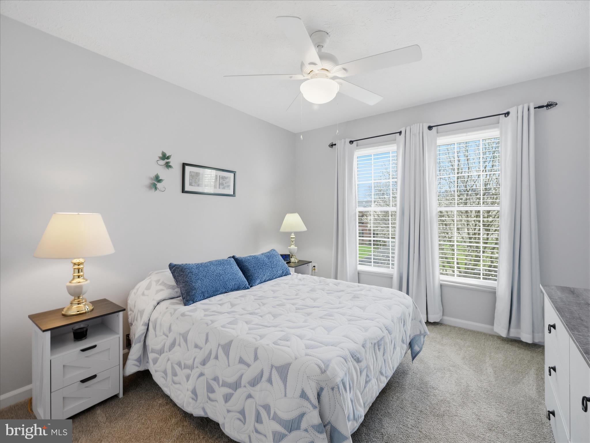 7 Coldstream Court Boonsboro, MD 21713 - Photo 29 of 43 a bedroom with a bed and a chandelier