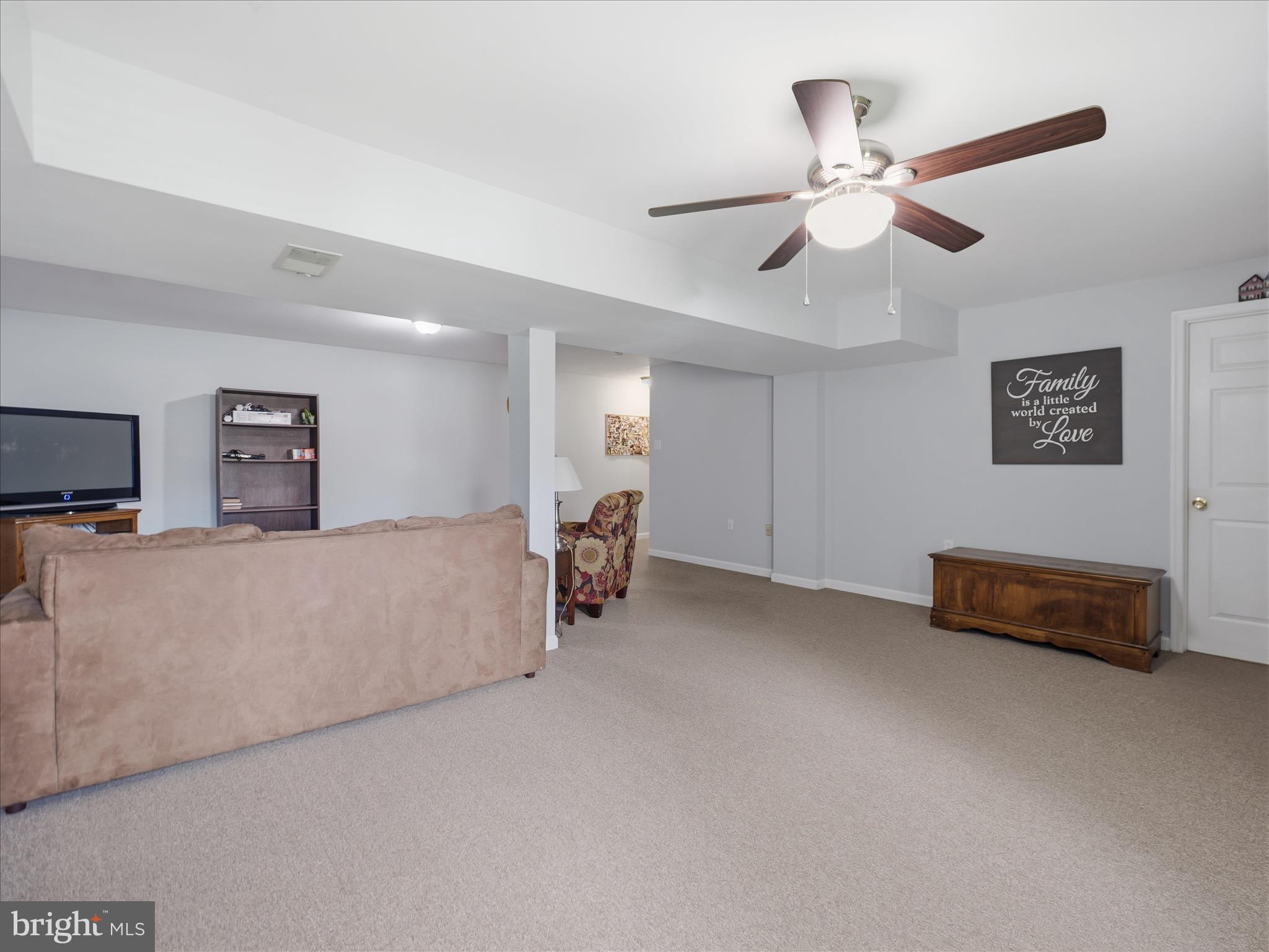 7 Coldstream Court Boonsboro, MD 21713 - Photo 34 of 43 a view of a livingroom with furniture and a ceiling fan